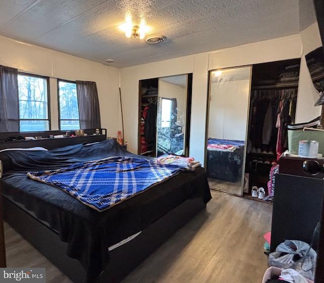 1375 Fried Meat Ridge Road Keyser, WV 26726 - Photo 33 of 52 a bedroom with bed and window