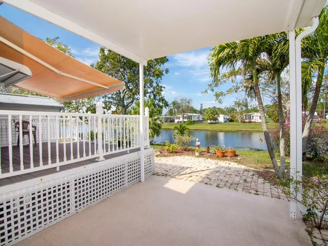 a view of a deck with a ocean view
