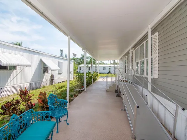 a view of a back yard from a balcony