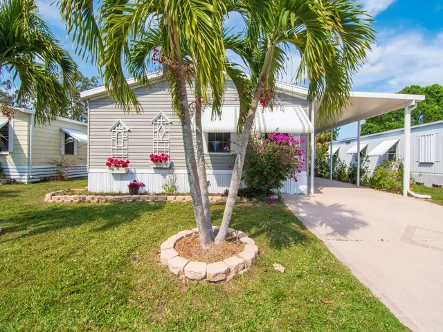 a front view of house with yard and entertaining space