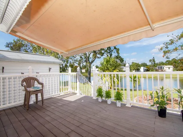 a view of a house with outdoor seating