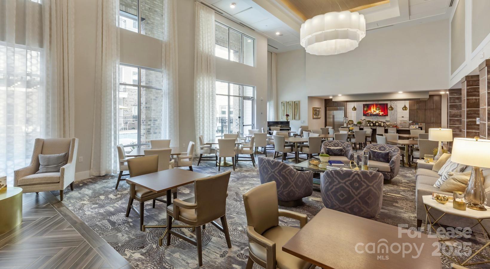 6805 Walnut Branch Lane, Unit 222 Charlotte, NC 28277 - Photo 2 of 22 a view of a dining room with furniture window and outside view