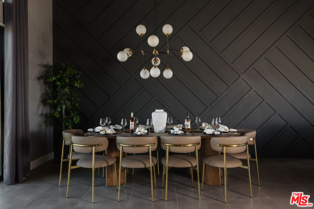 6765 Swanson Road Joshua Tree, CA 92252 - Photo 12 of 69 a view of a dinning table and chairs in a patio