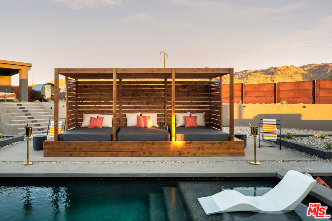 6765 Swanson Road Joshua Tree, CA 92252 - Photo 45 of 69 a view of swimming pool with outdoor seating