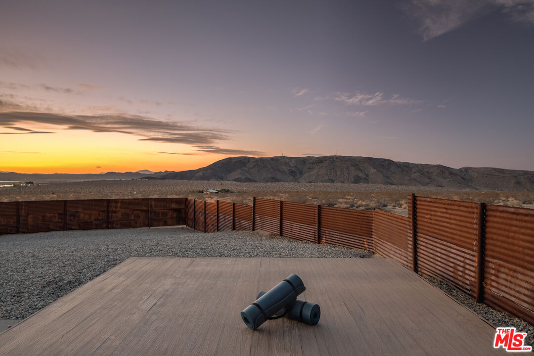 6765 Swanson Road Joshua Tree, CA 92252 - Photo 59 of 69 a view of a terrace with mountain view