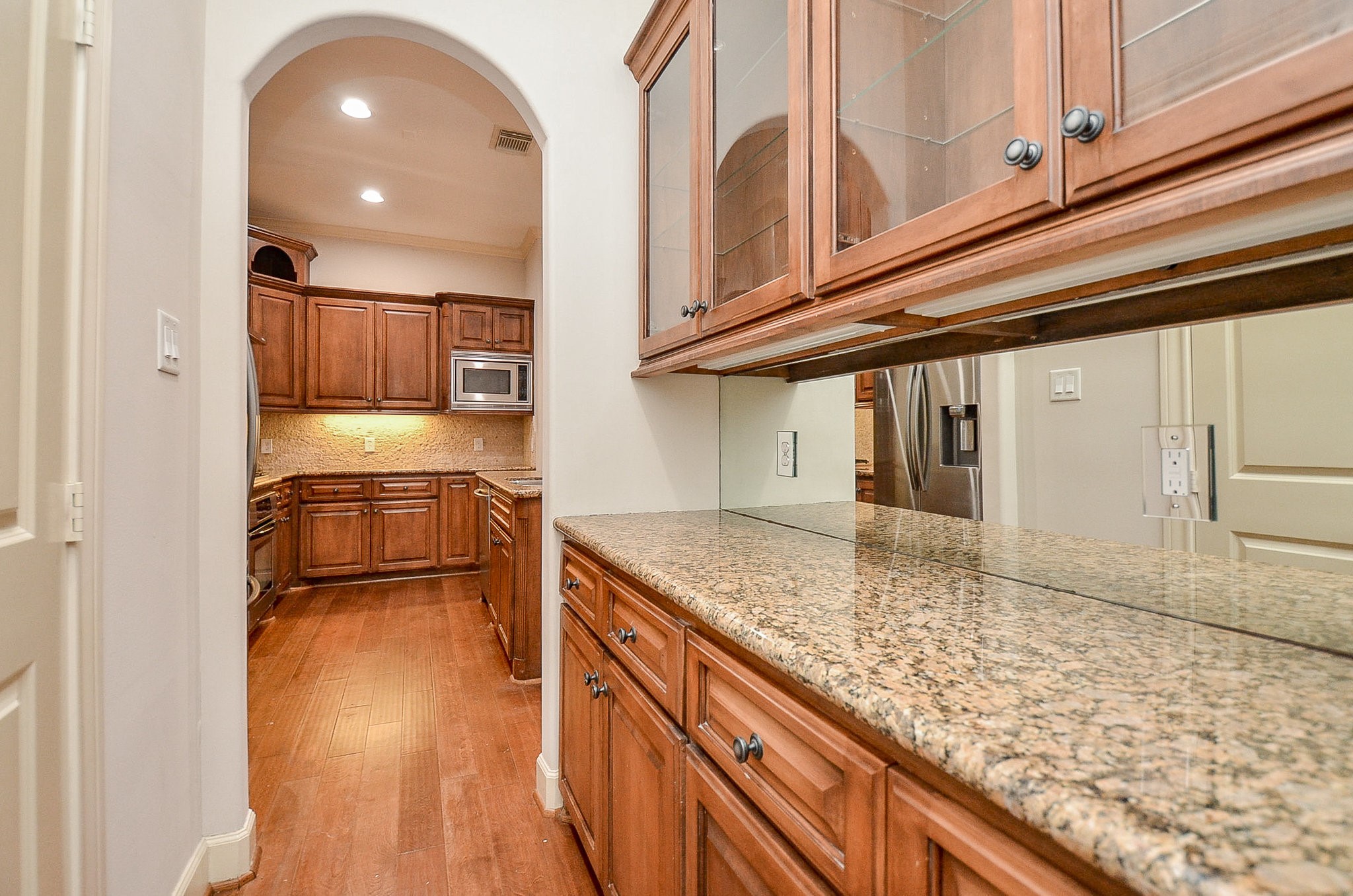 5512 Hidalgo Street Houston, TX 77056 - Photo 12 of 32 a kitchen with stainless steel appliances granite countertop a sink and cabinets