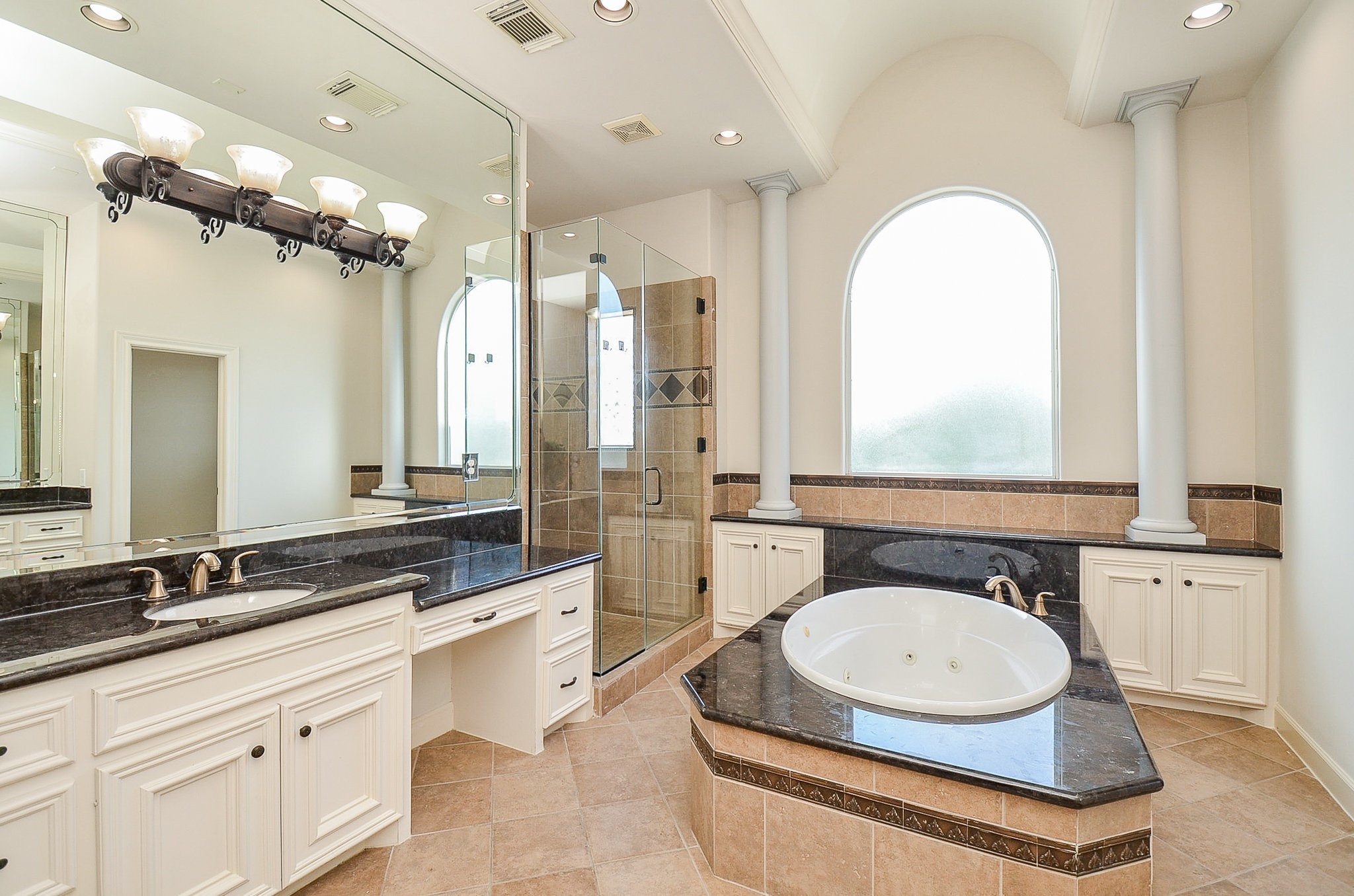 5512 Hidalgo Street Houston, TX 77056 - Photo 21 of 32 a bathroom with a sink and a mirror