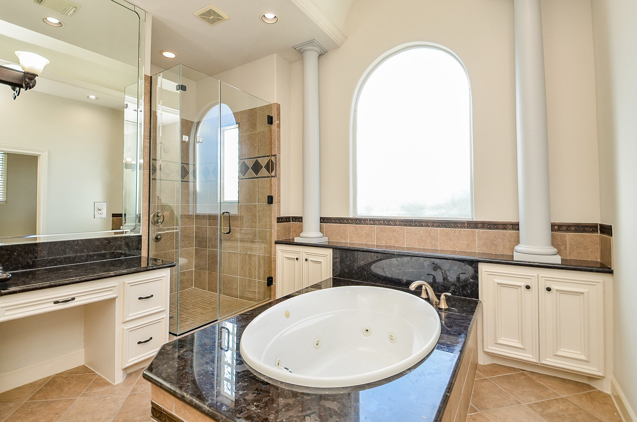 5512 Hidalgo Street Houston, TX 77056 - Photo 22 of 32 a bathroom with a sink a toilet a mirror and shower