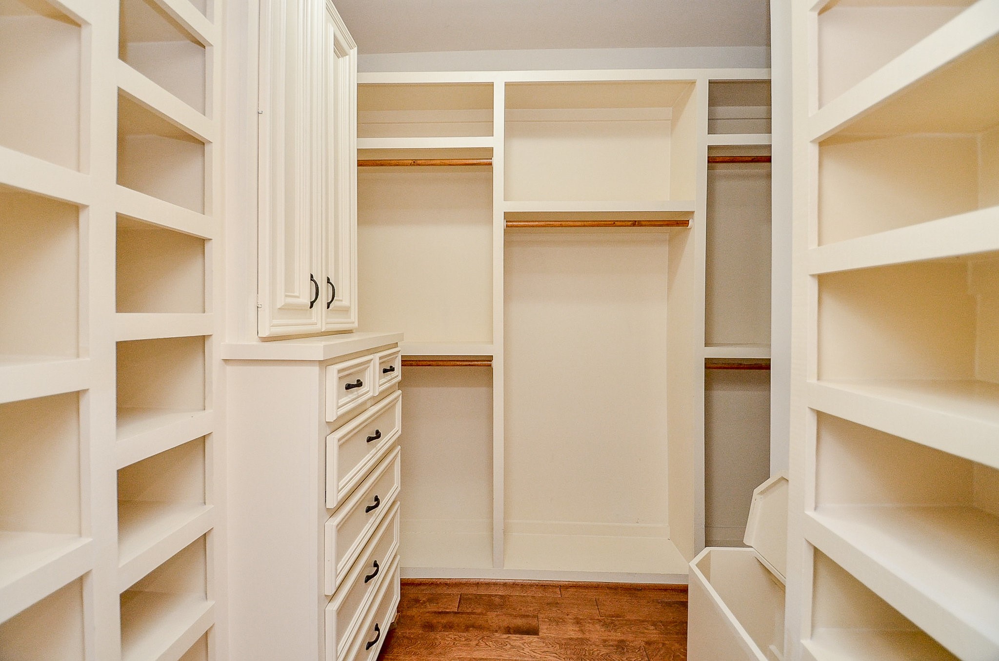 5512 Hidalgo Street Houston, TX 77056 - Photo 23 of 32 a view of an entryway with wooden floor and cabinet
