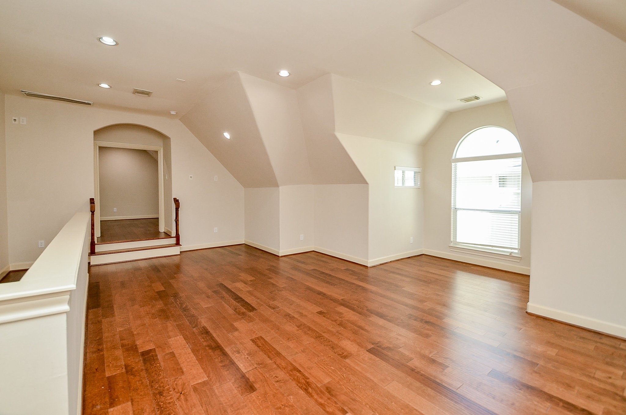 5512 Hidalgo Street Houston, TX 77056 - Photo 26 of 32 a view of empty room with wooden floor and fan