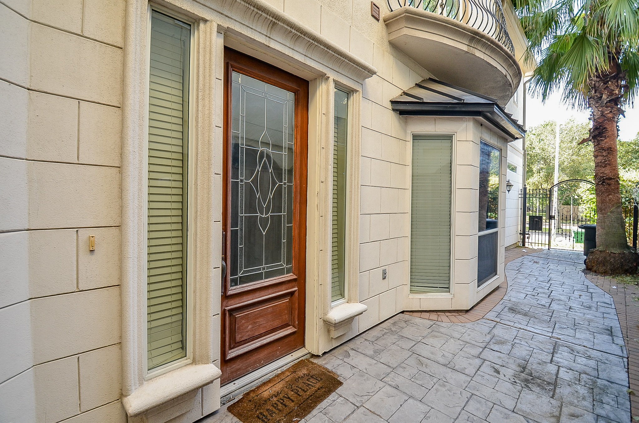 5512 Hidalgo Street Houston, TX 77056 - Photo 3 of 32 a view of a porch with a door and a porch