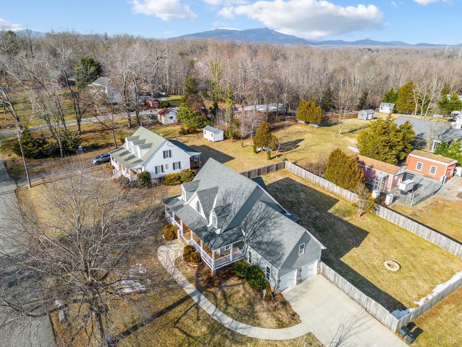 4802 Old Boonsboro Road Lynchburg, VA 24503 - Photo 12 of 57 a view of a swimming pool with a patio and a yard
