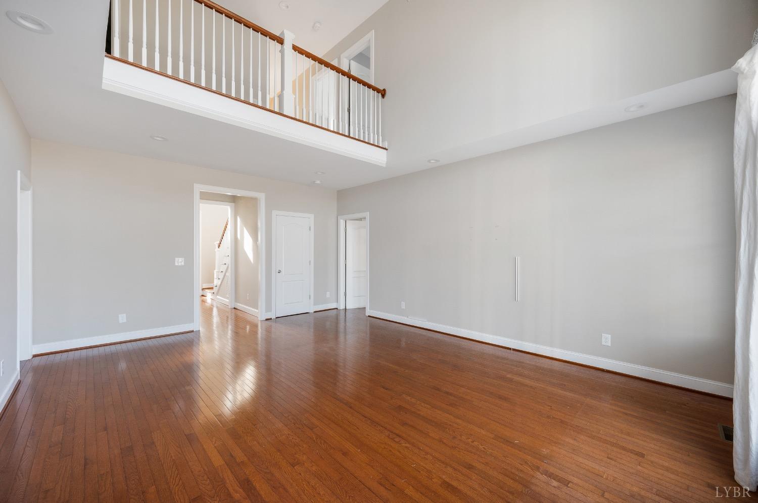 4802 Old Boonsboro Road Lynchburg, VA 24503 - Photo 22 of 57 a view of an empty room with wooden floor