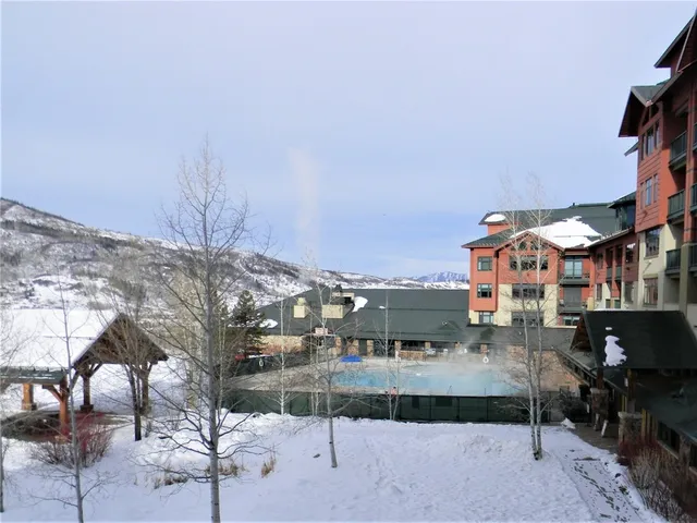 a view of a terrace with a lake view