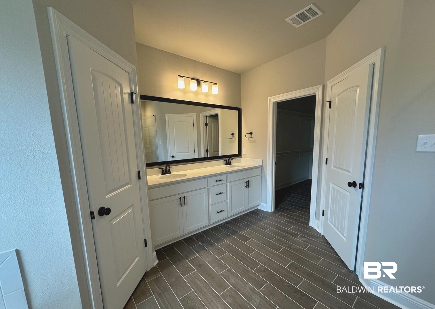 888 Sumter Loop Foley, AL 36535 - Photo 4 of 8 Bathroom featuring double sink vanity