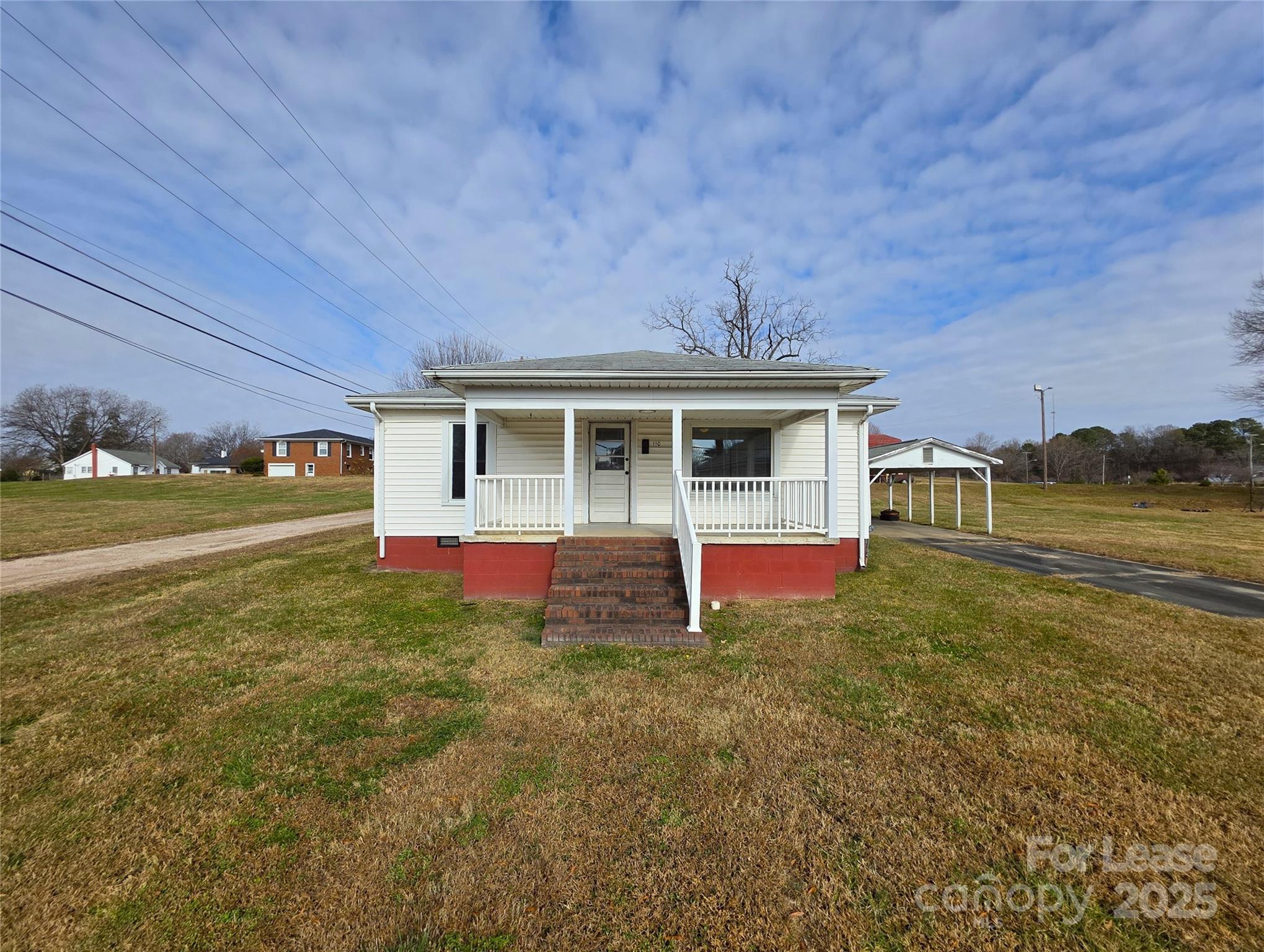 110 West 22nd Street Kannapolis, NC 28081 - Photo 15 of 15 a view of a house with backyard and sitting area