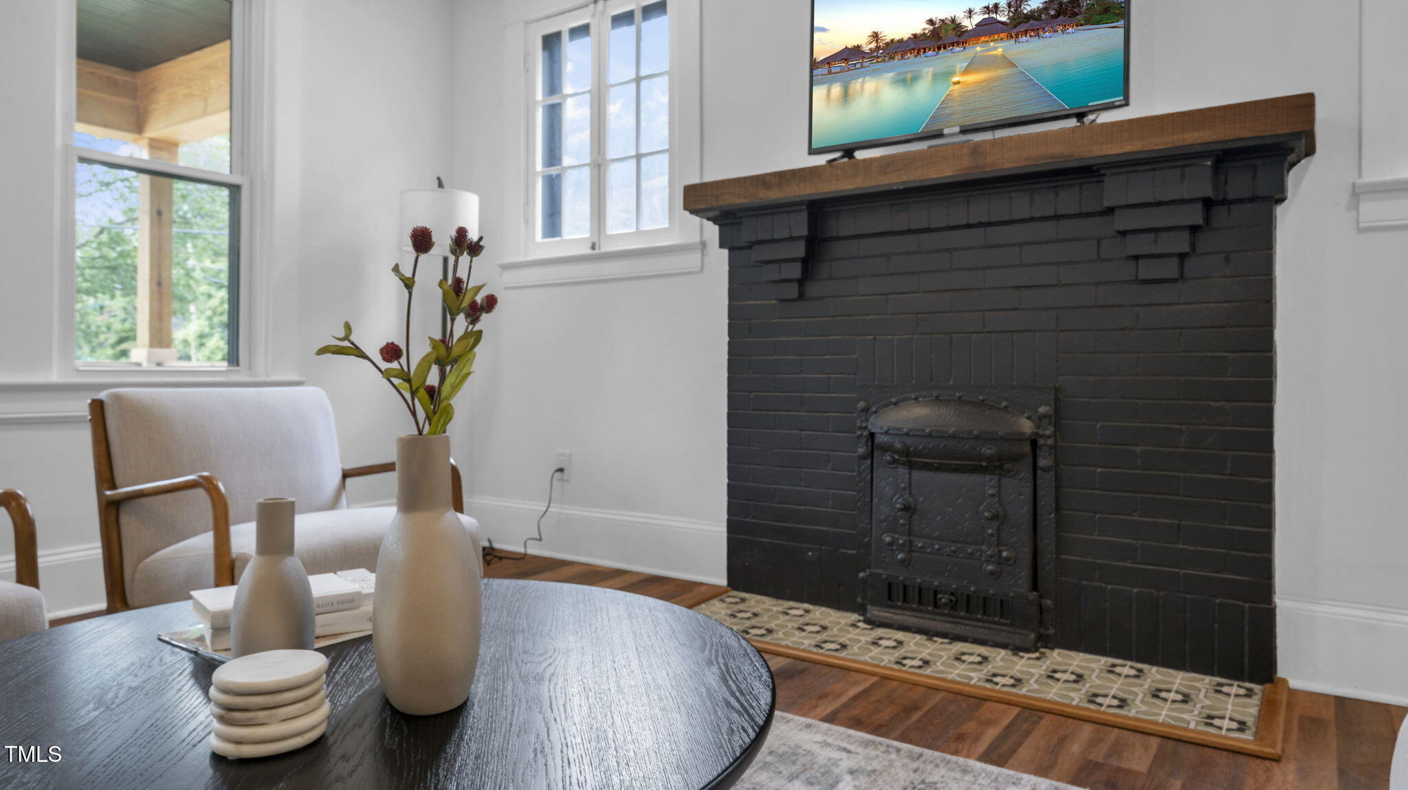 1307 Wake Forest Road Raleigh, NC 27604 - Photo 18 of 51 a living room with furniture and a window