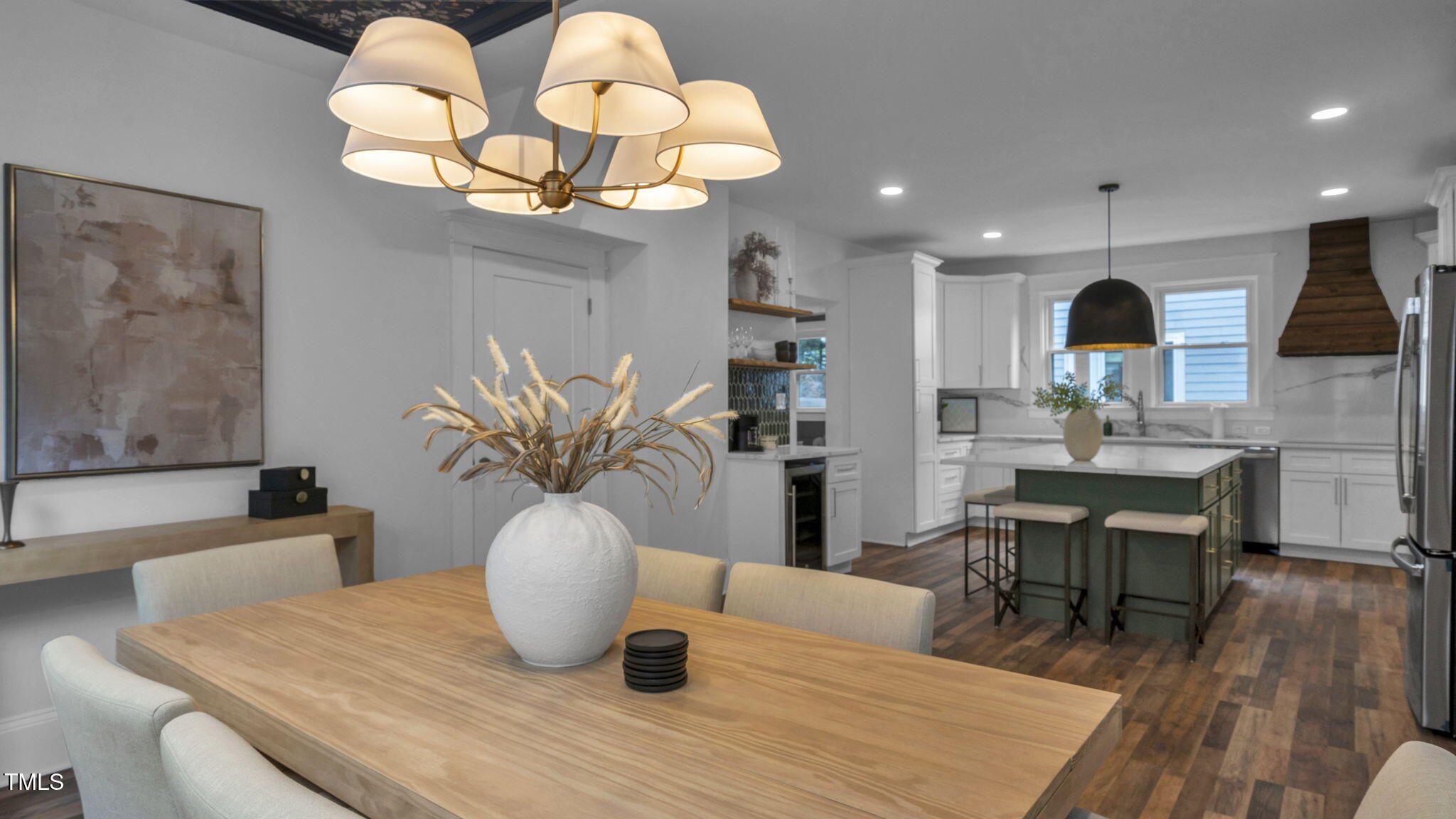 1307 Wake Forest Road Raleigh, NC 27604 - Photo 22 of 51 a view of a dining room with furniture and wooden floor