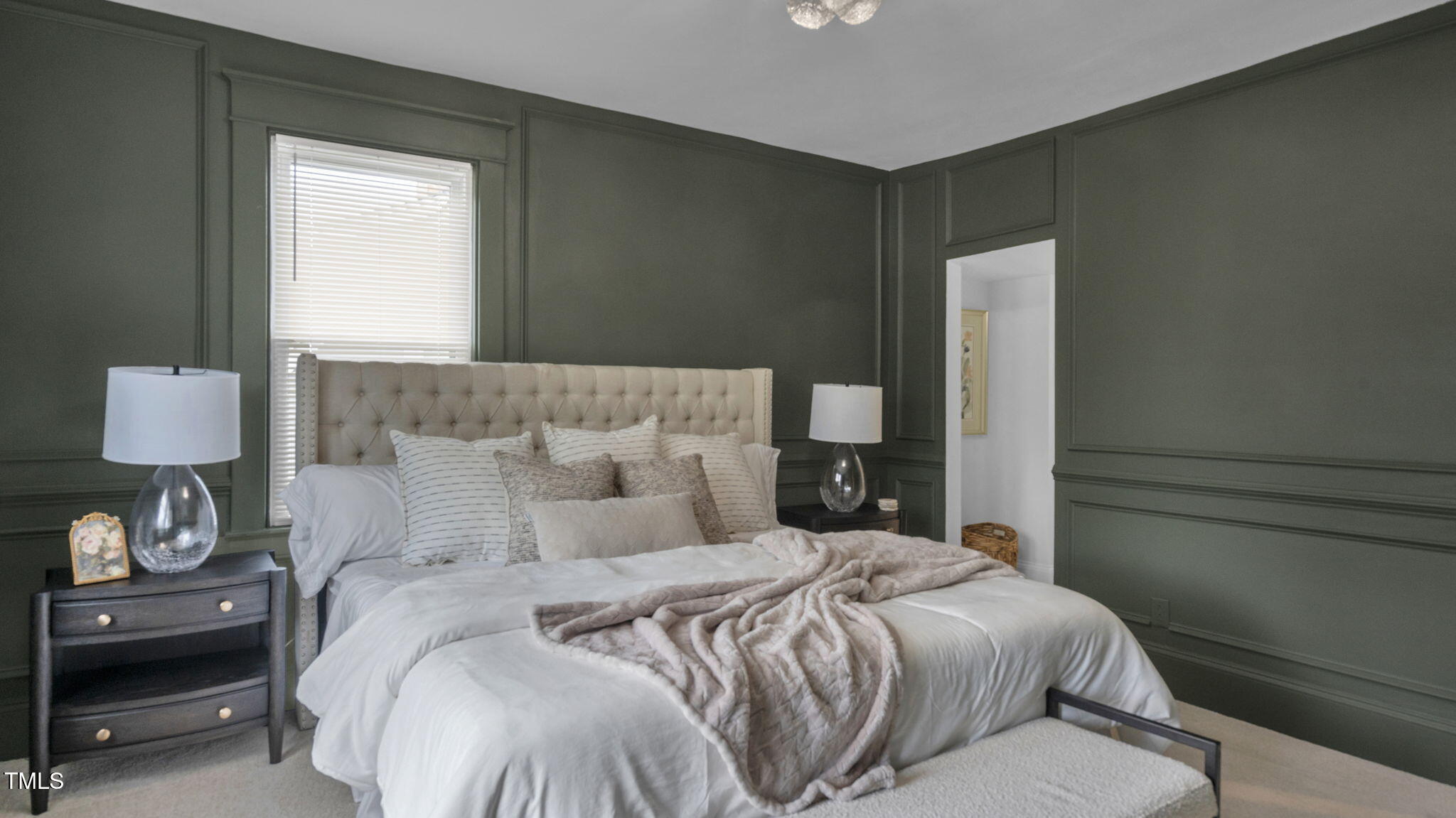 1307 Wake Forest Road Raleigh, NC 27604 - Photo 32 of 51 a bedroom with a bed and a lamp