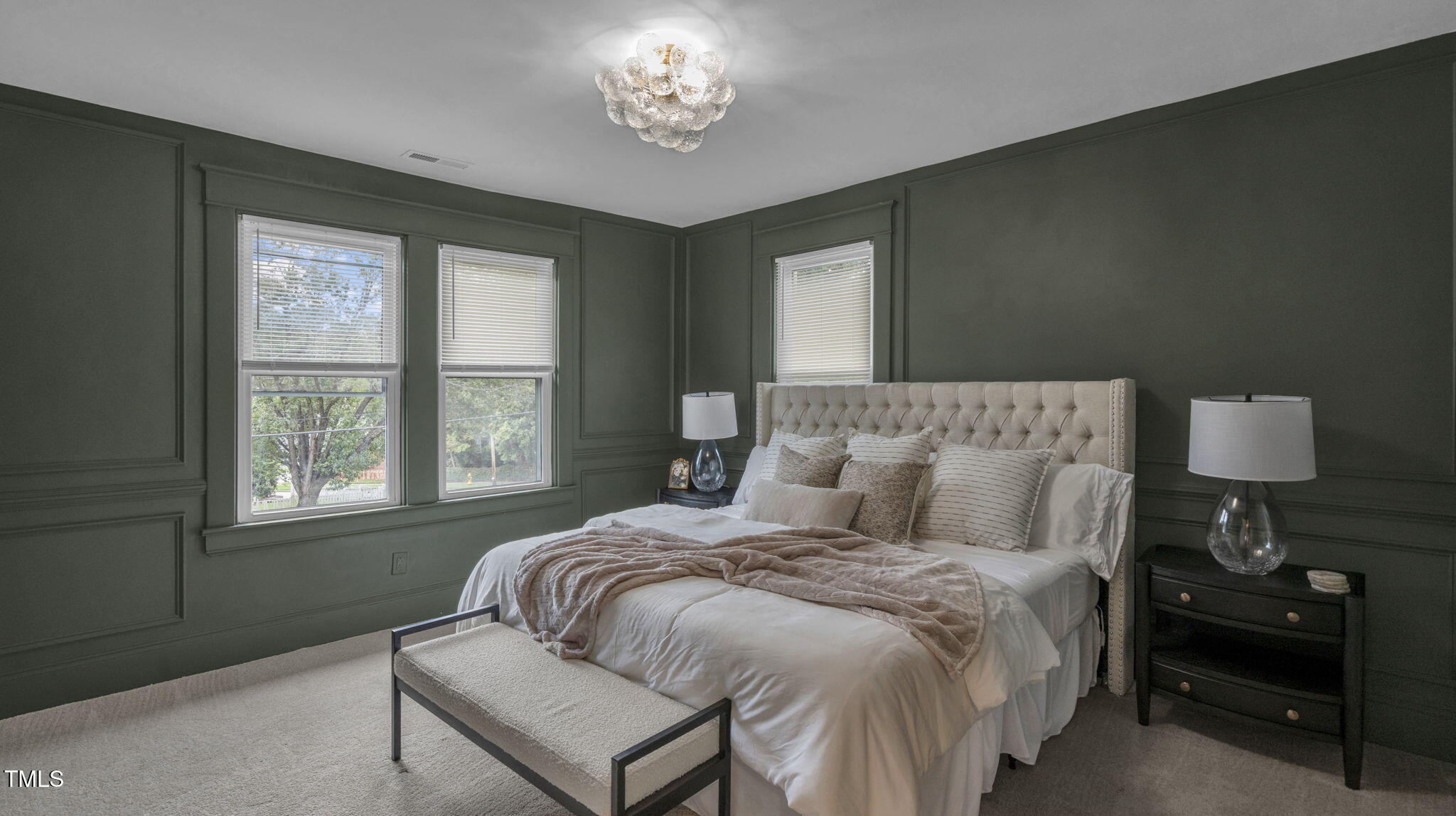 1307 Wake Forest Road Raleigh, NC 27604 - Photo 33 of 51 a bedroom with a bed and a window