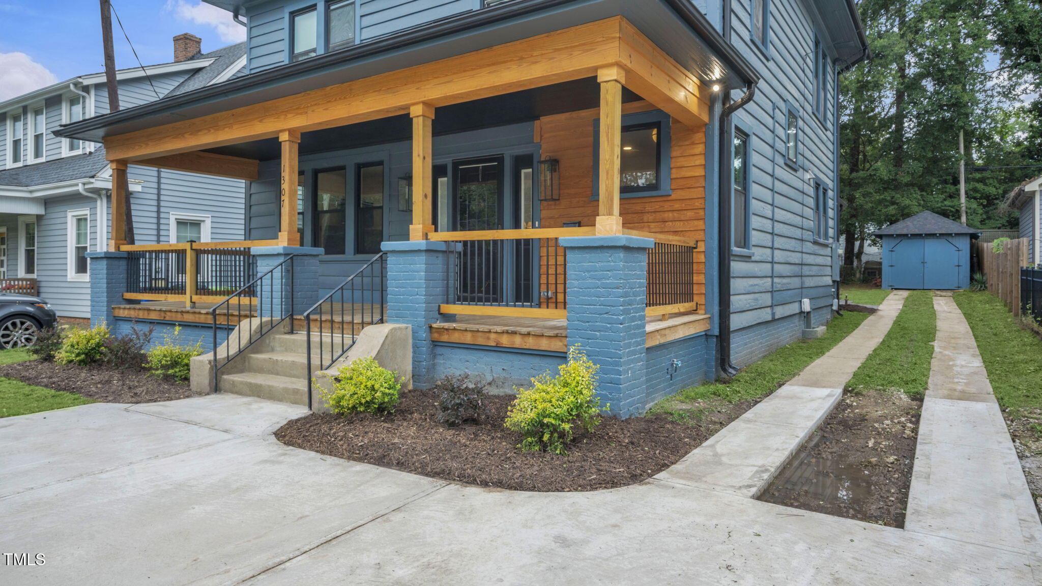 1307 Wake Forest Road Raleigh, NC 27604 - Photo 6 of 51 a view of a house with backyard and garden