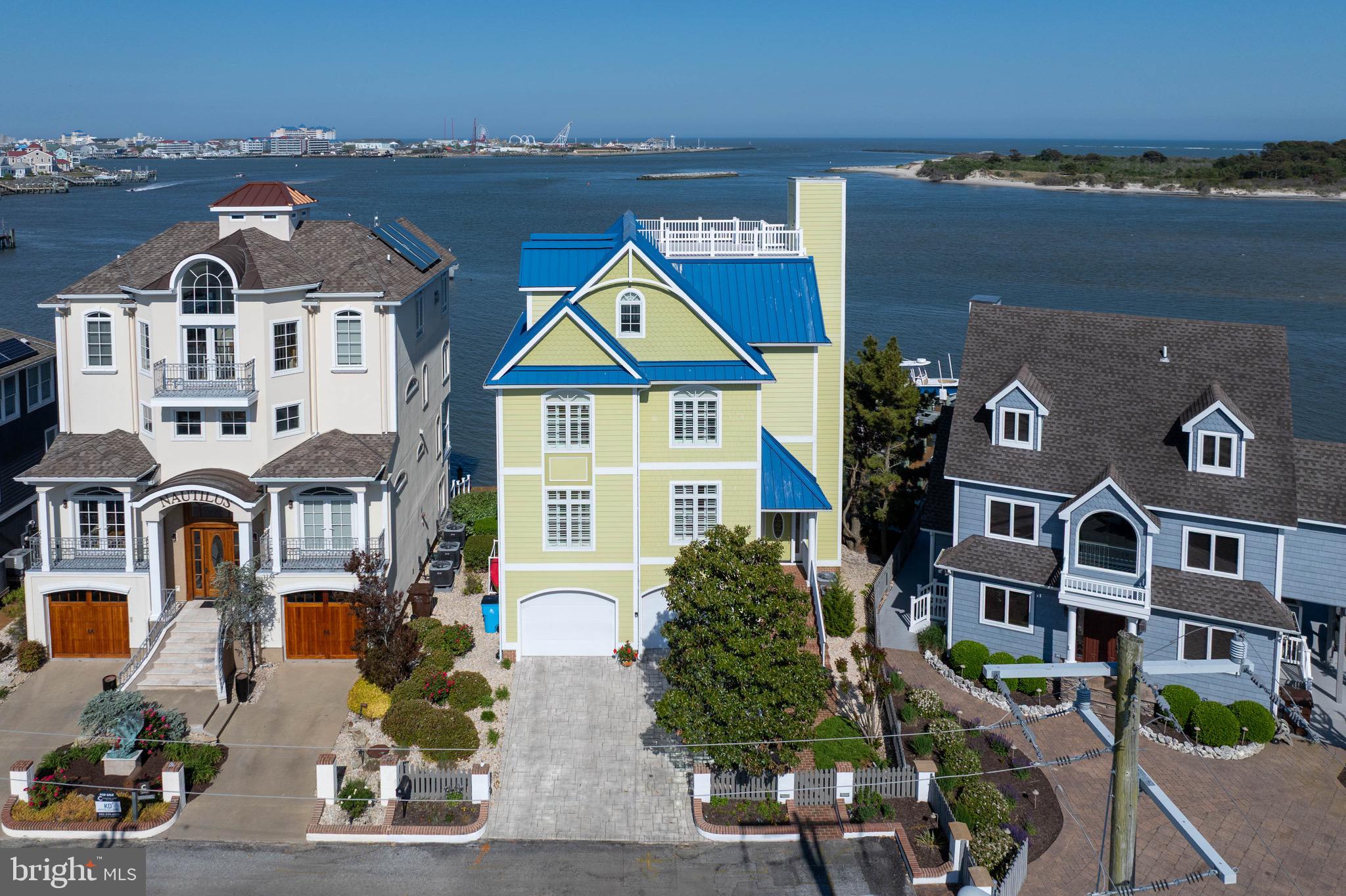 12959 Harbor Road Ocean City, MD 21842 - Photo 68 of 85 an aerial view of a residential apartment building with a yard