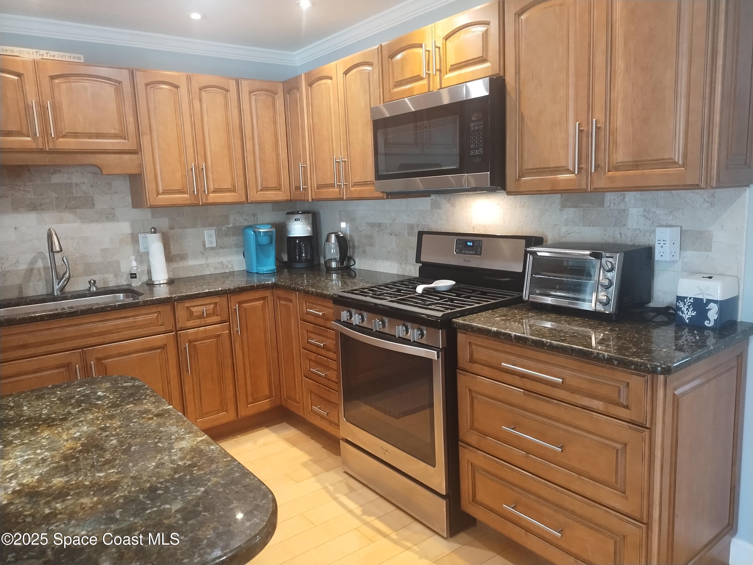 233 South Brevard Avenue Cocoa Beach, FL 32931 - Photo 14 of 56 IMG_20250424_094806908