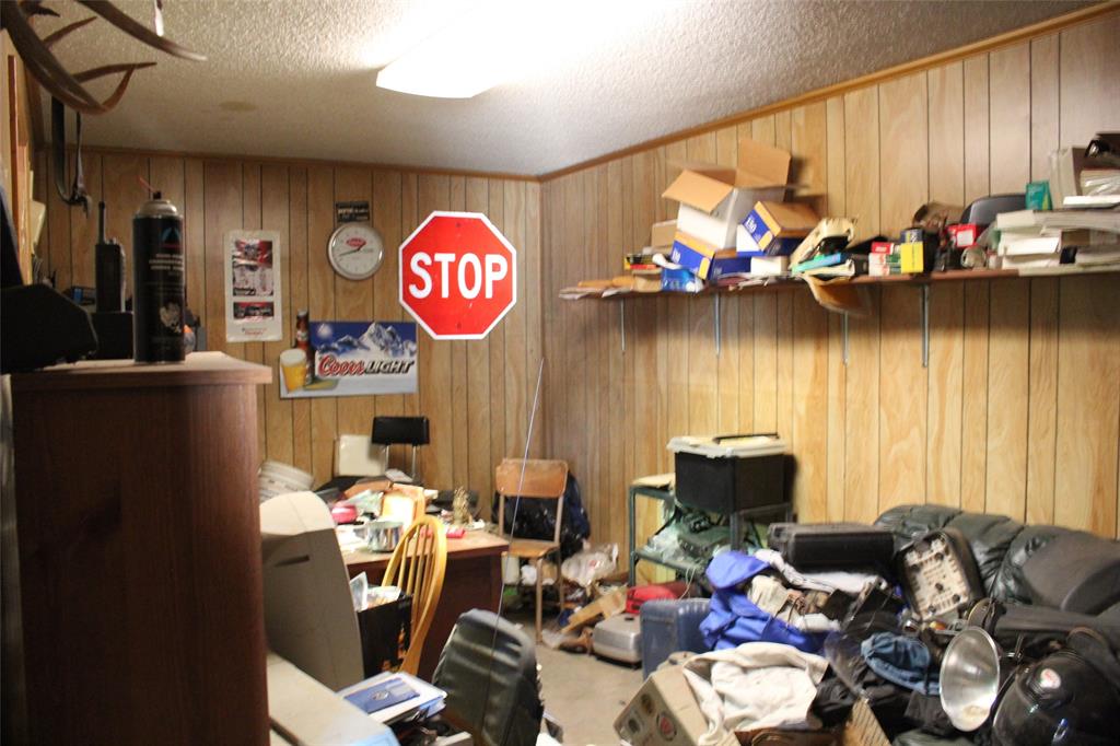 105 South 5th Street Goree, TX 76363 - Photo 9 of 11 a view of a workspace with furniture and a window