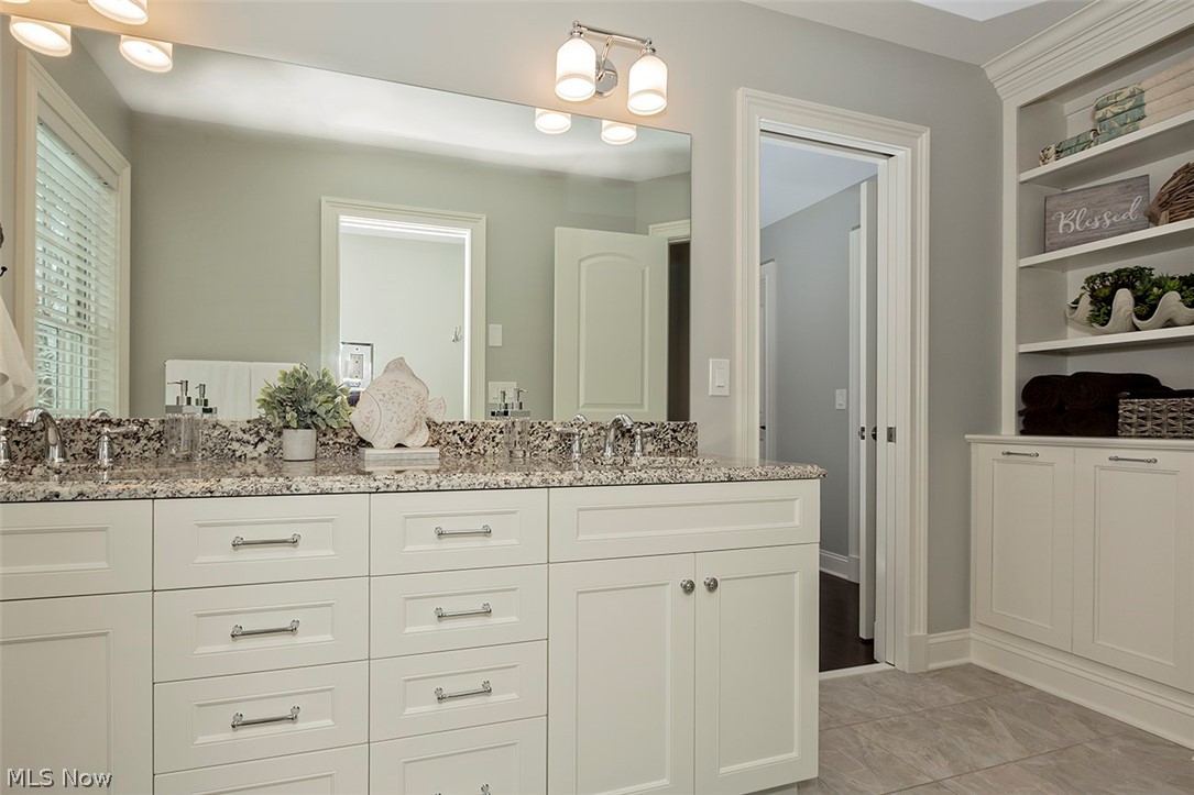 22688 Douglas Road Shaker Heights, OH 44122 - Photo 15 of 28 Full bathroom with tub and shower that is shared by bedroom 1 and 2
