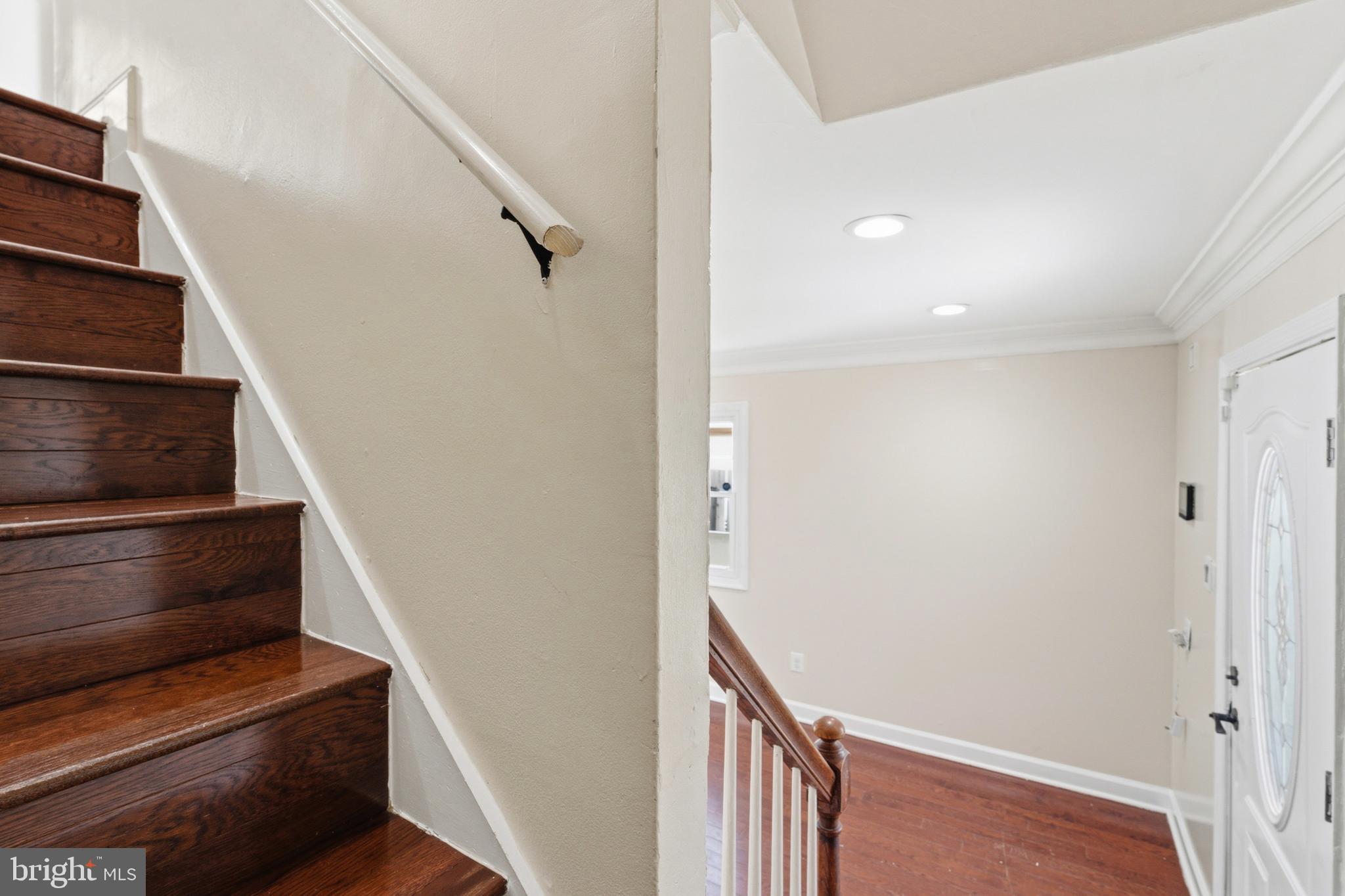 7204 East Inwood Street Landover, MD 20785 - Photo 14 of 24 a view of entryway and hall with wooden floor