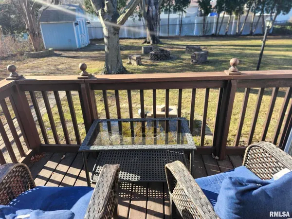 a swimming pool with wooden fence