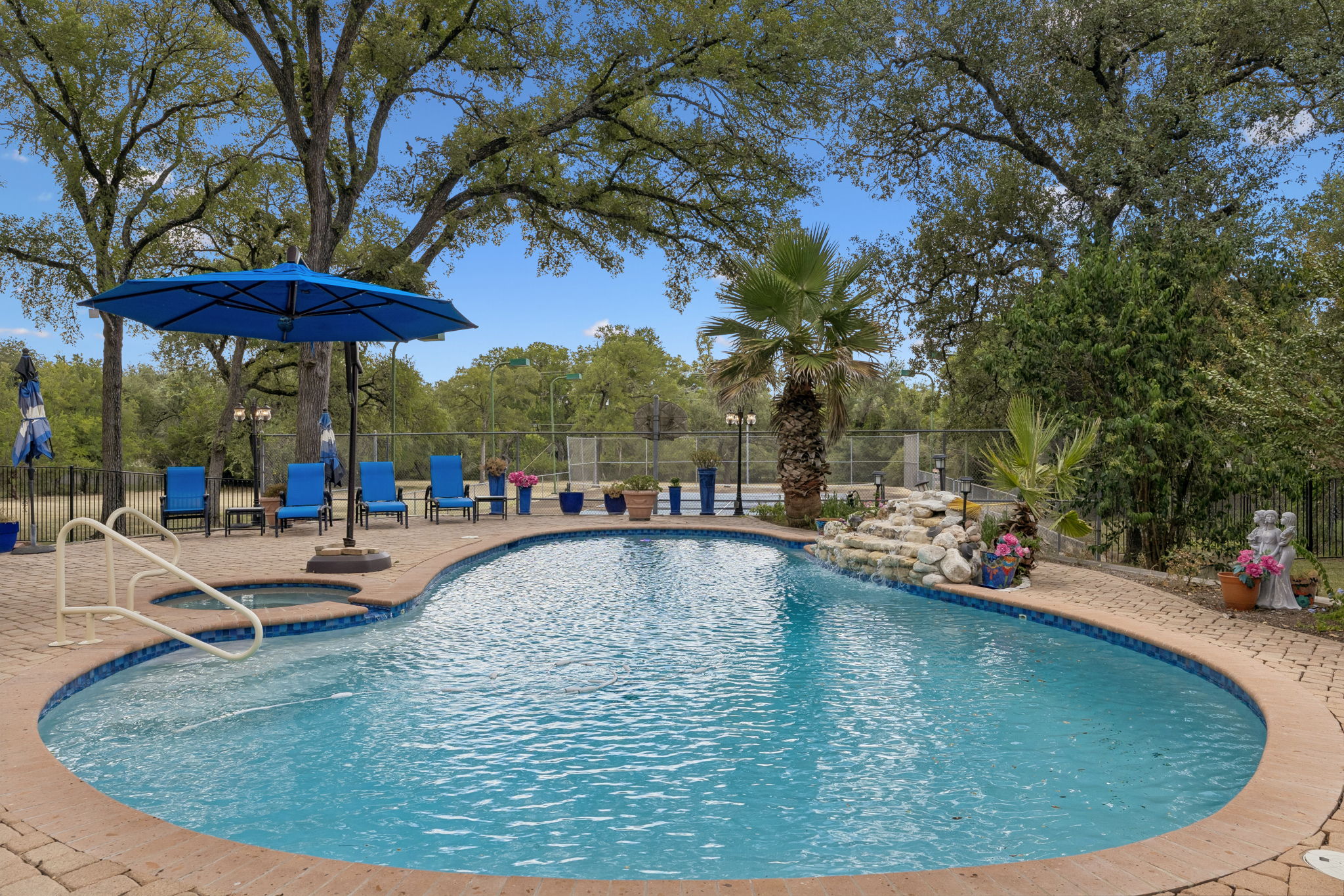 9911 Anderson Mill Road Austin, TX 78750 - Photo 25 of 39 Pool and Waterfall