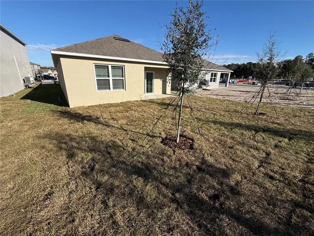 a house view with a outdoor space