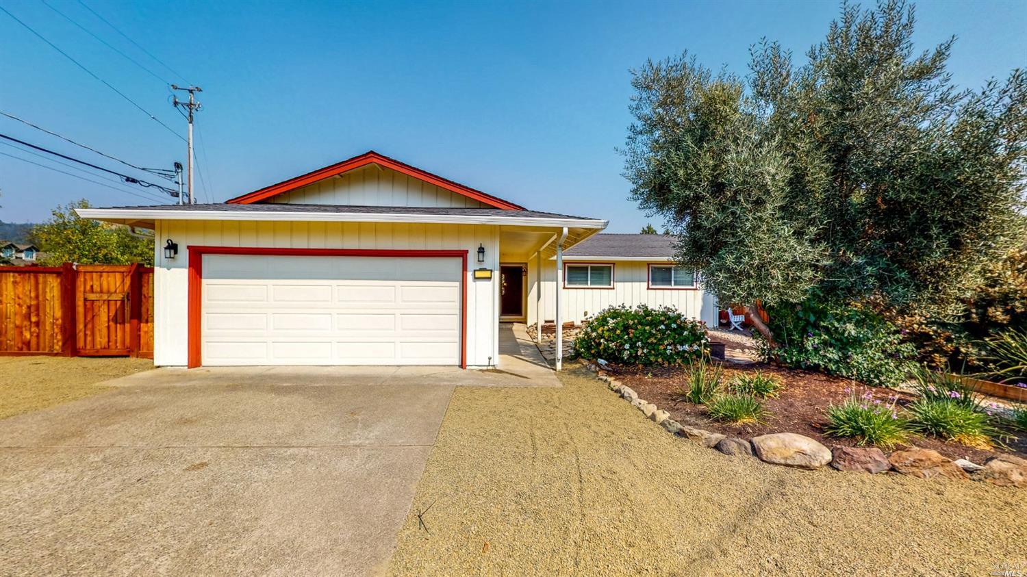 1070 Baird Road Santa Rosa, CA 95409 - Photo 1 of 1 a front view of a house with yard