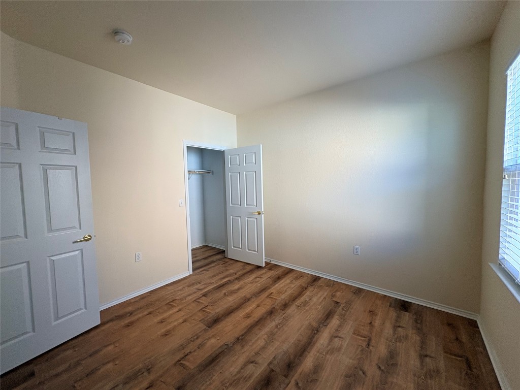 318 Crockett Loop Georgetown, TX 78633 - Photo 20 of 29 a view of hallway with wooden floor