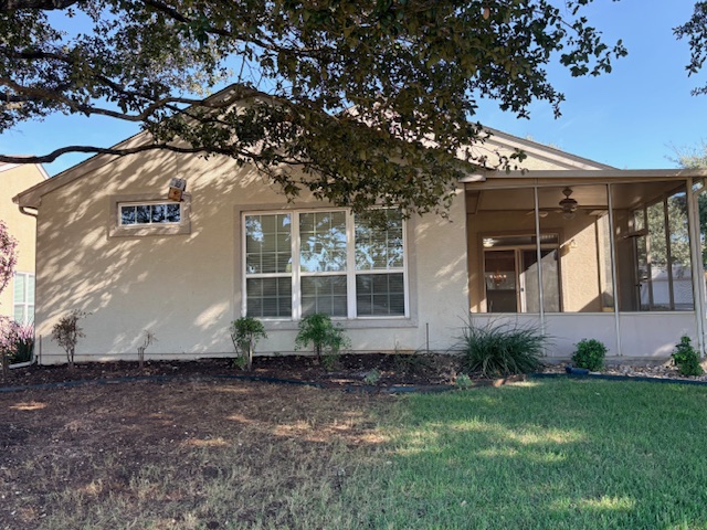 318 Crockett Loop Georgetown, TX 78633 - Photo 25 of 29 a view of a house with a garden