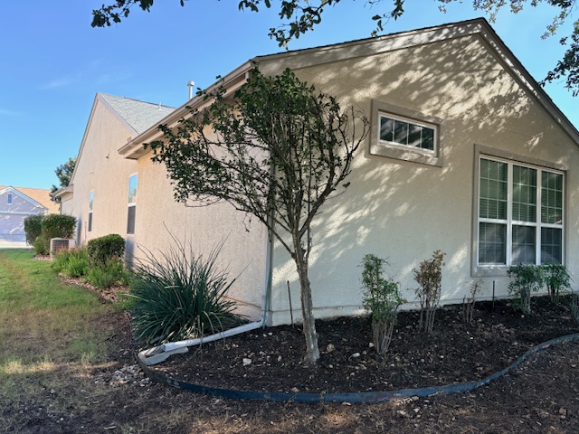 318 Crockett Loop Georgetown, TX 78633 - Photo 27 of 29 a front view of a house with garden