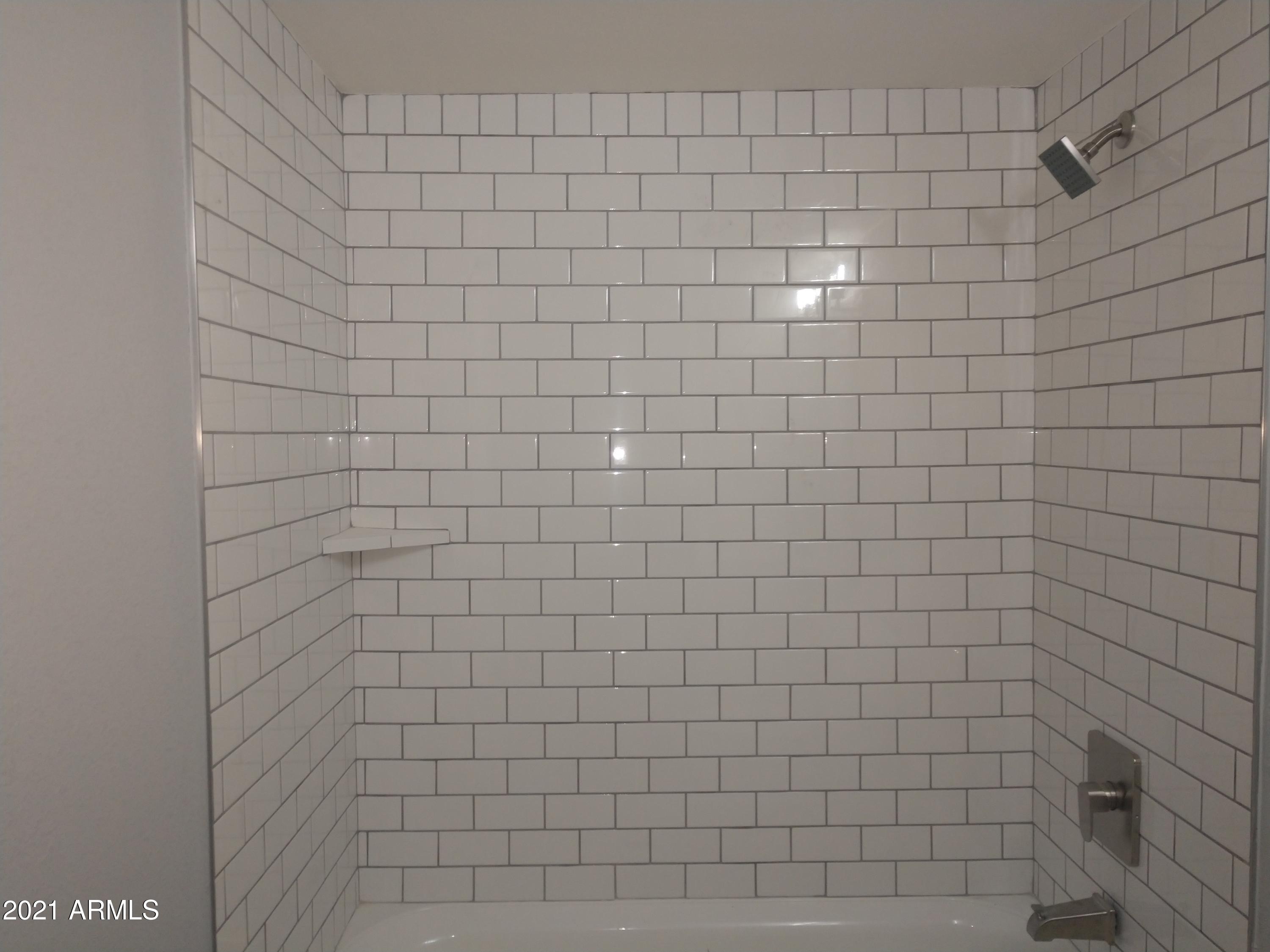 4020 West Palomino Road Phoenix, AZ 85019 - Photo 18 of 20 Tiled Shower