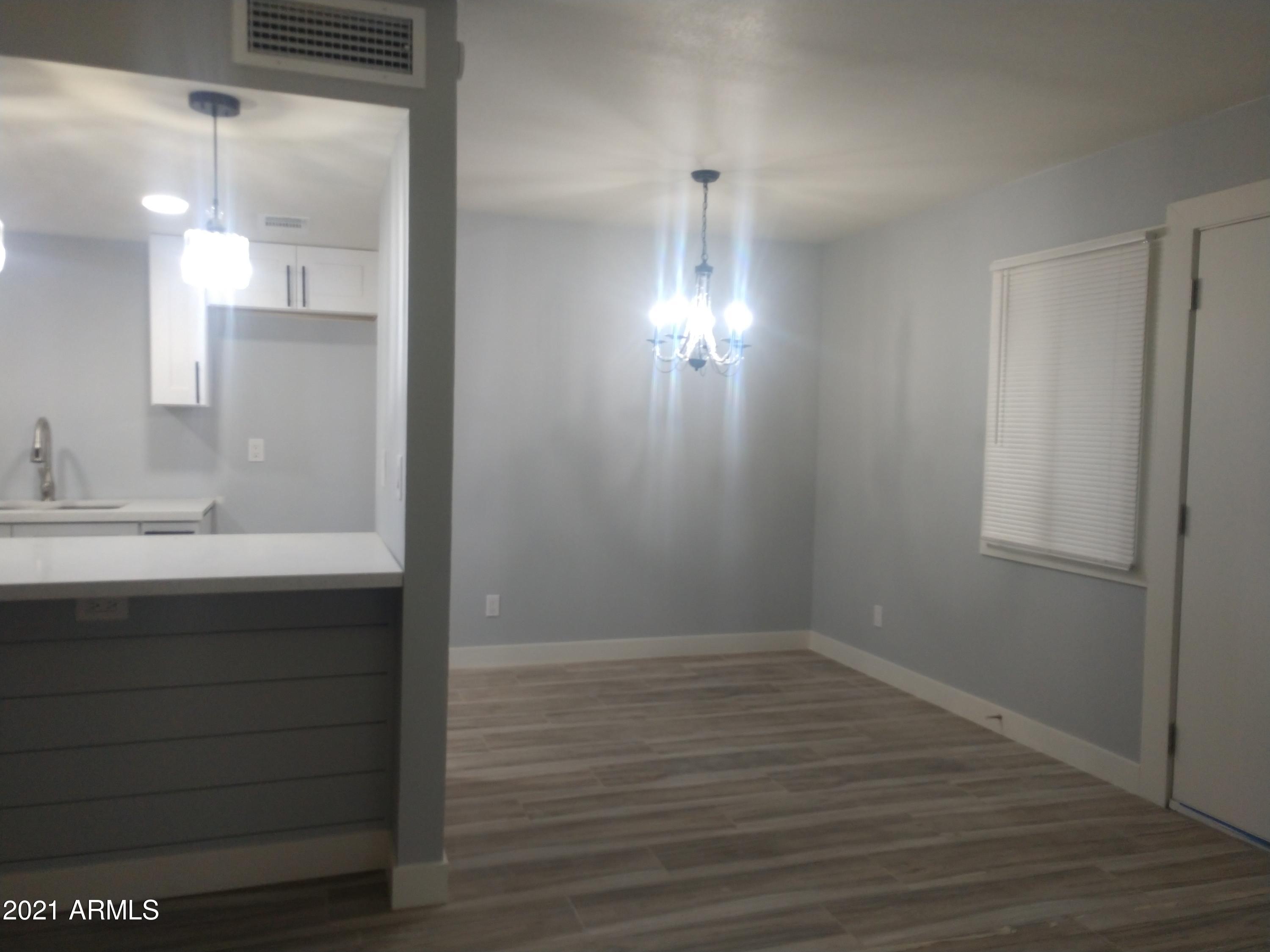 4020 West Palomino Road Phoenix, AZ 85019 - Photo 7 of 20 DINING AREA