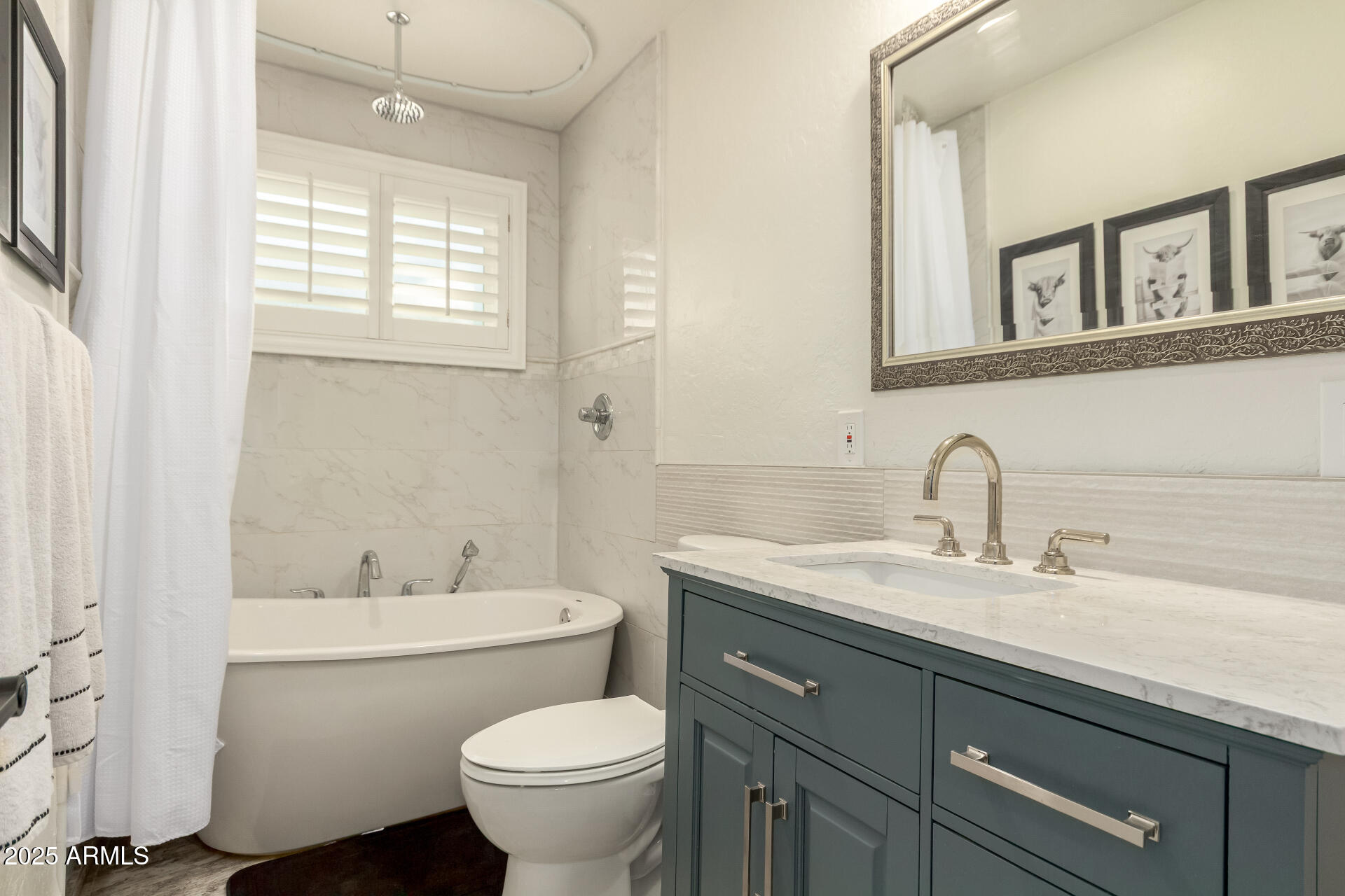 1935 East Coolidge Street Phoenix, AZ 85016 - Photo 26 of 34 a bathroom with a toilet sink and mirror
