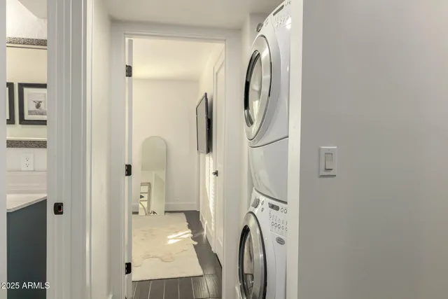a bathroom with a shower and mirror