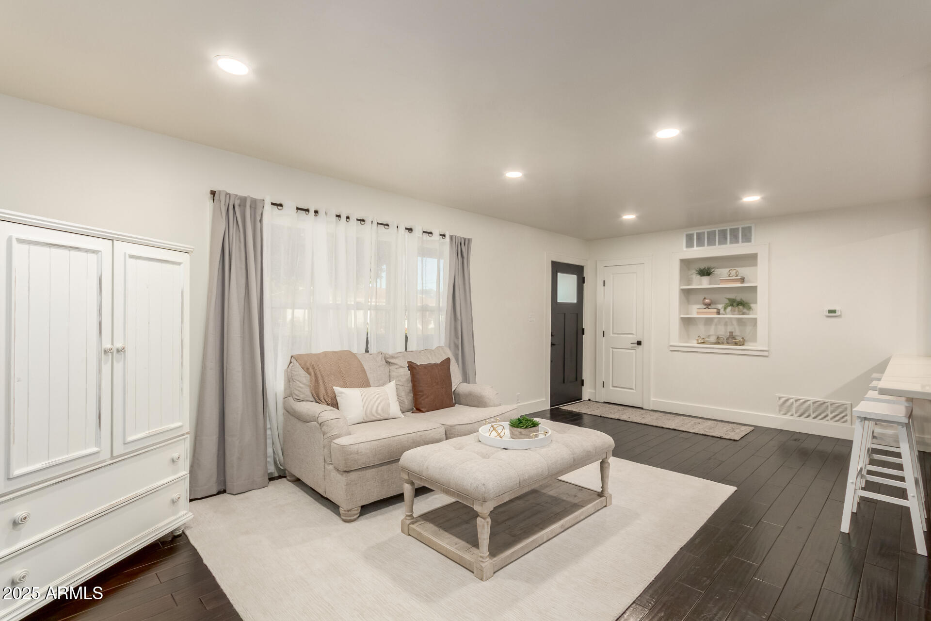 1935 East Coolidge Street Phoenix, AZ 85016 - Photo 9 of 34 a living room with furniture and a large window
