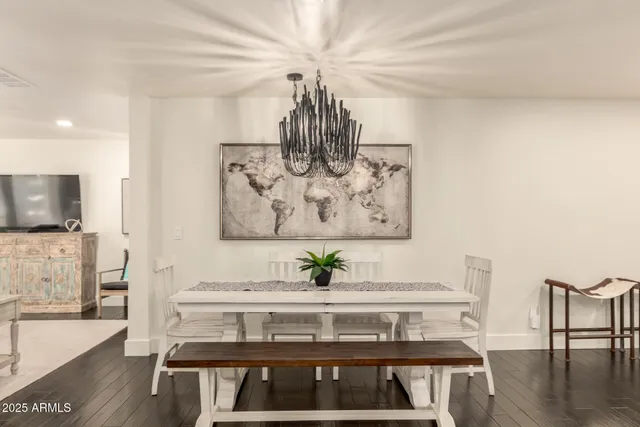 a view of a livingroom with furniture and wooden floor