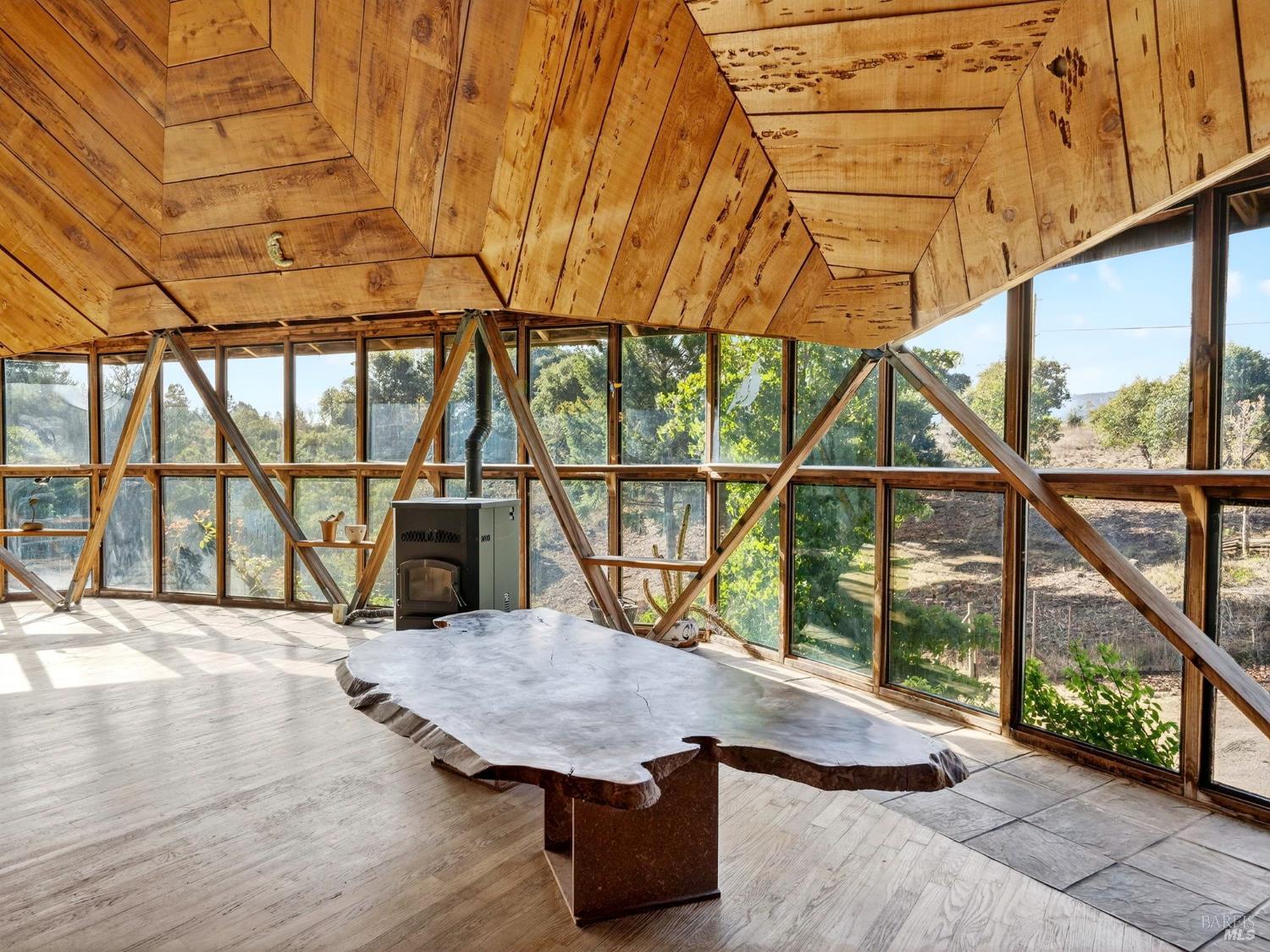 2333 Guntley Road Philo, CA 95466 - Photo 15 of 57 a view of a balcony with furniture and wooden floor