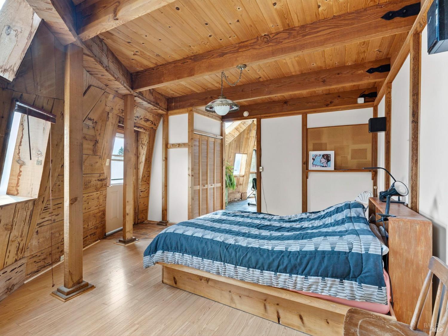 2333 Guntley Road Philo, CA 95466 - Photo 24 of 57 a bedroom with a large bed and a large window