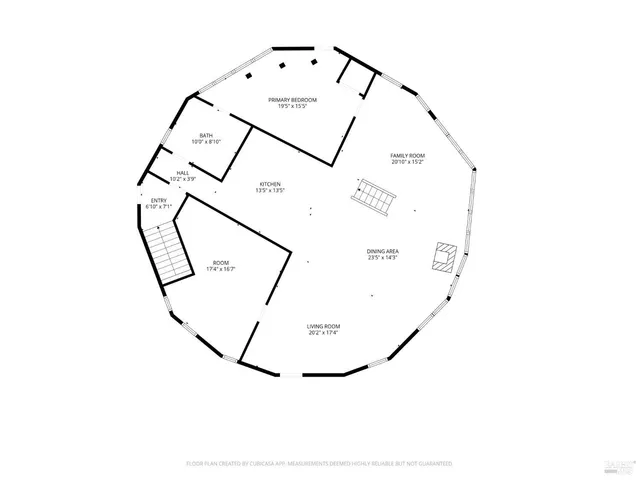a living room with furniture a flat screen tv and a floor to ceiling window