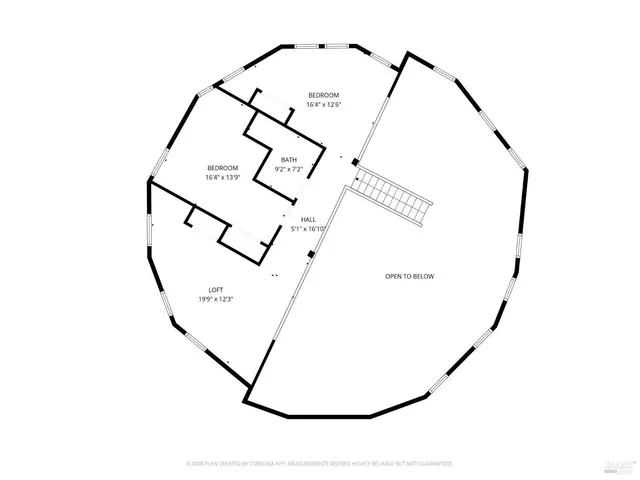 a view of a chairs and table in the patio