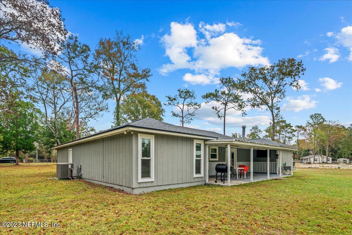 4755 Leopard Circle Middleburg, FL 32068 - Photo 27 of 38 a view of a house with a yard