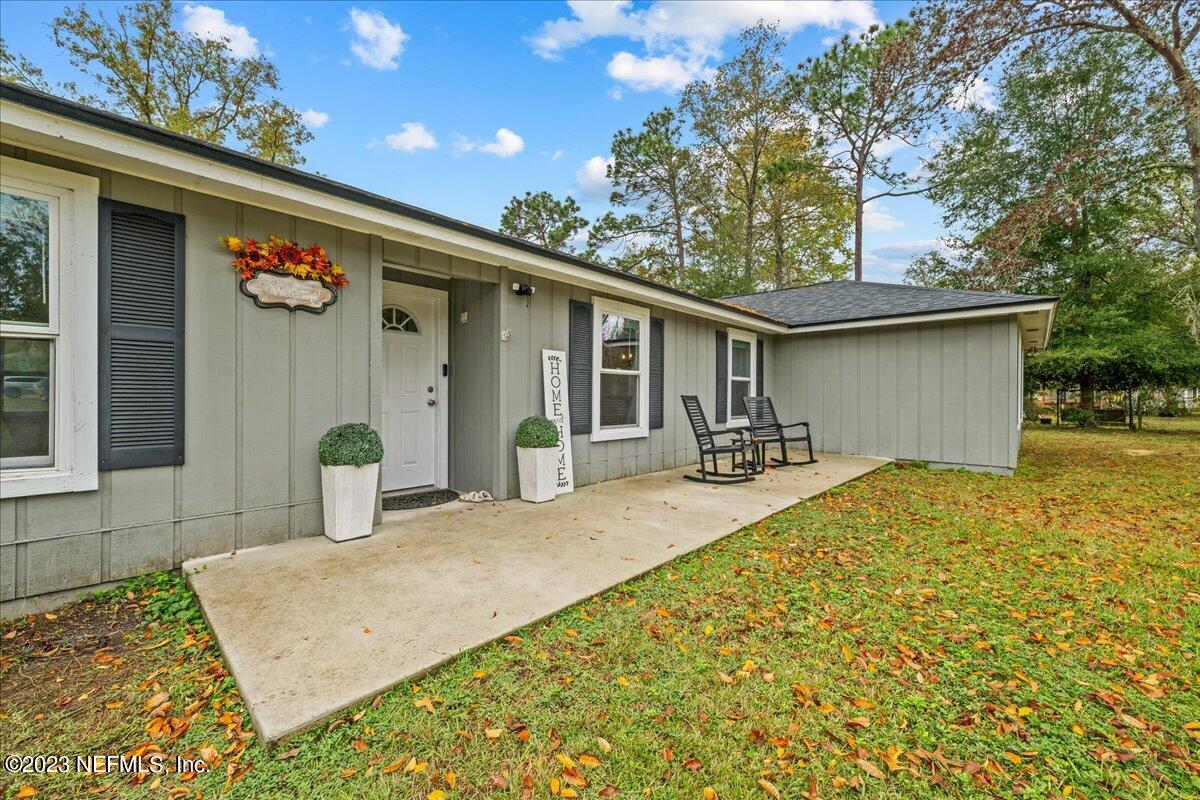 4755 Leopard Circle Middleburg, FL 32068 - Photo 3 of 38 a front view of house with yard