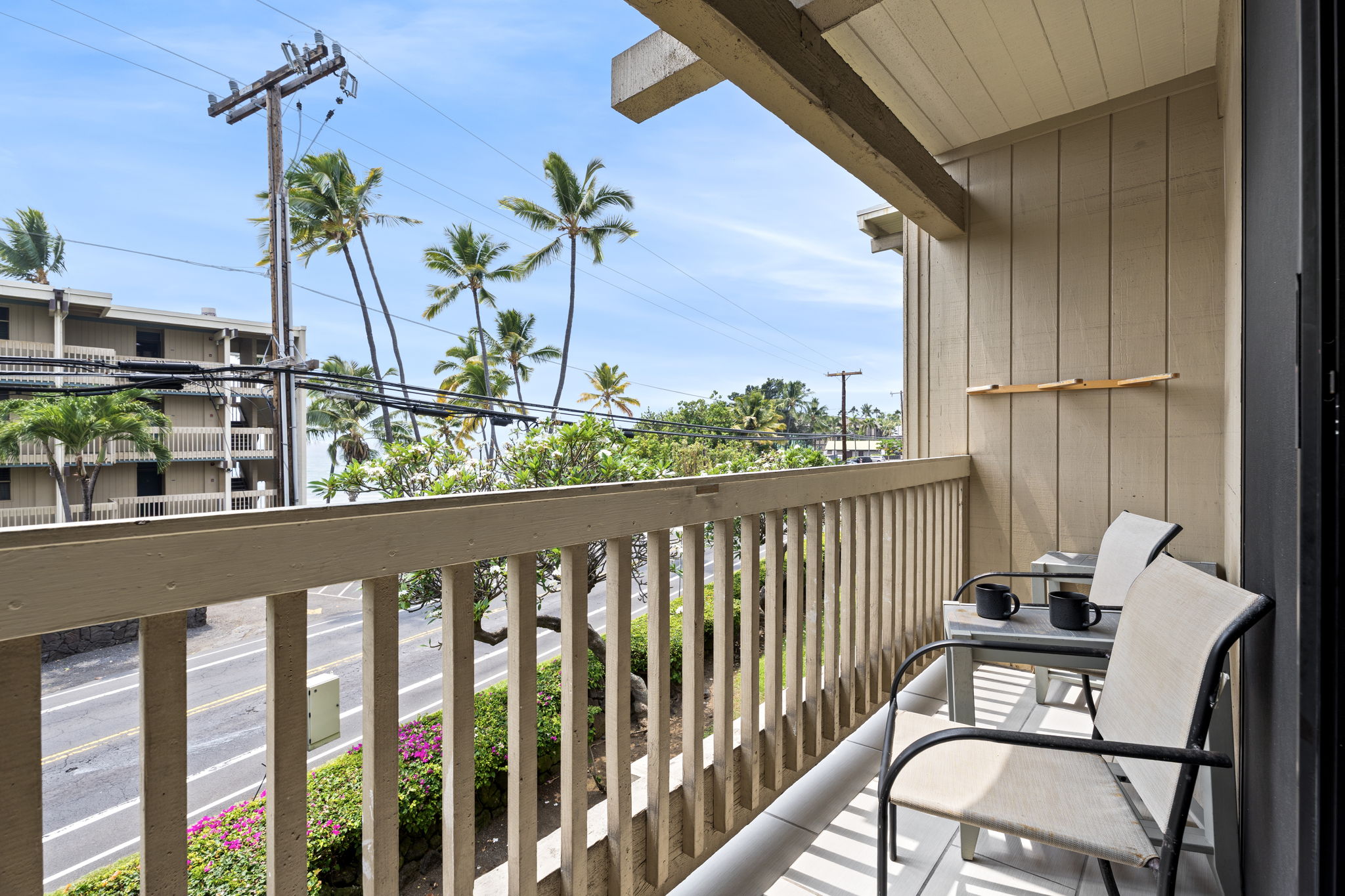 76-6233 Alii Drive, Unit 264 Kailua-Kona, HI 96740 - Photo 4 of 17 a view of a balcony with furniture
